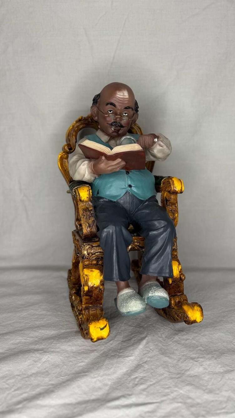 Vintage American Elderly Grandfather Reading a Book in Rocking Chair Figurine